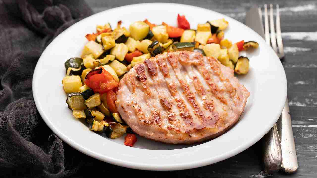 Hamburger di pollo al piatto